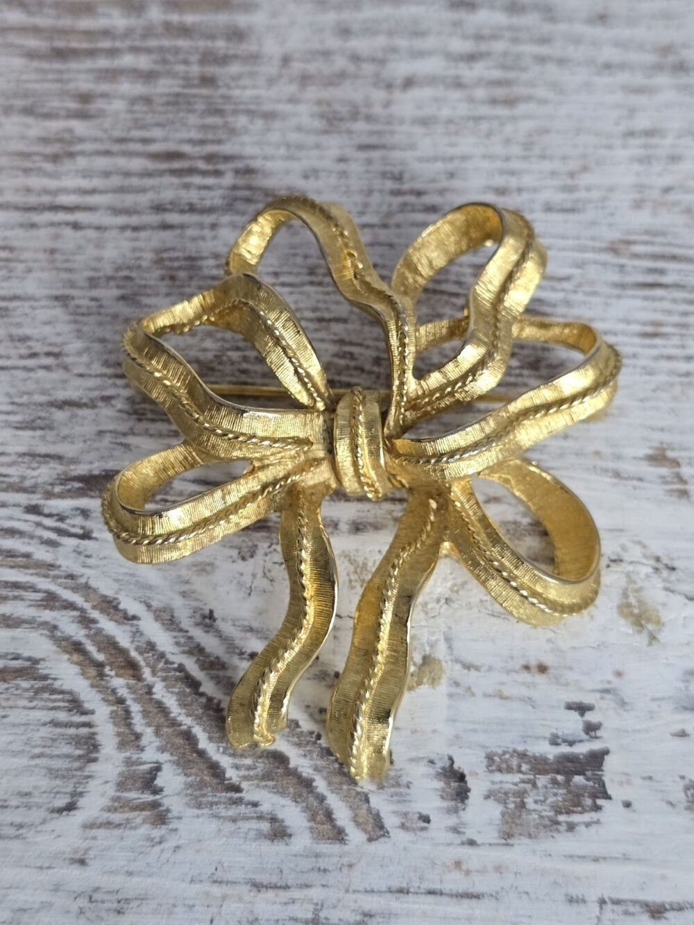 Vintage Monet Gold Tone Ribbon Bow Brooch Textured Designer Pin #140